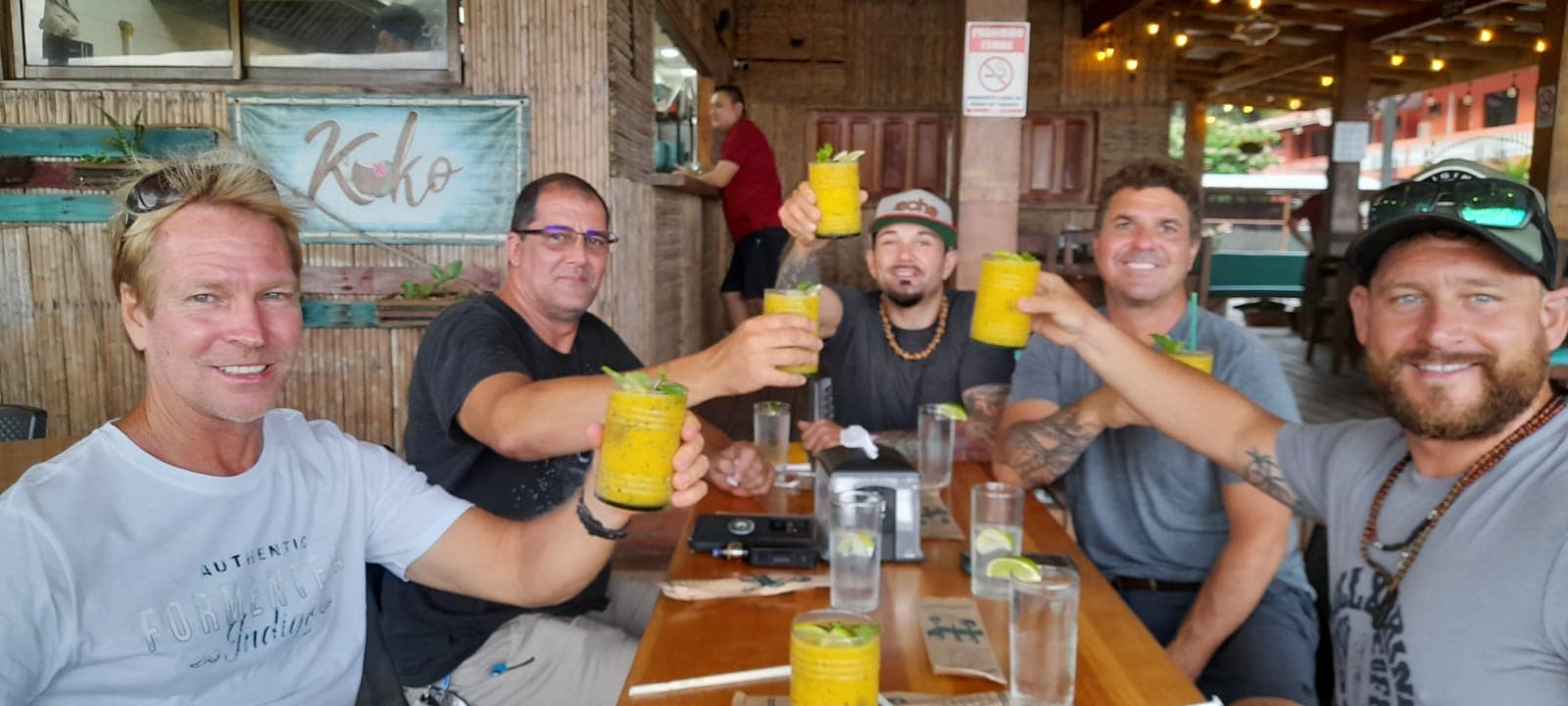 Guests enjoying drinks in Jacó